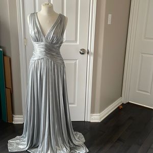 Melanie Lyne silver gown size 10 paid 320 with tags never worn